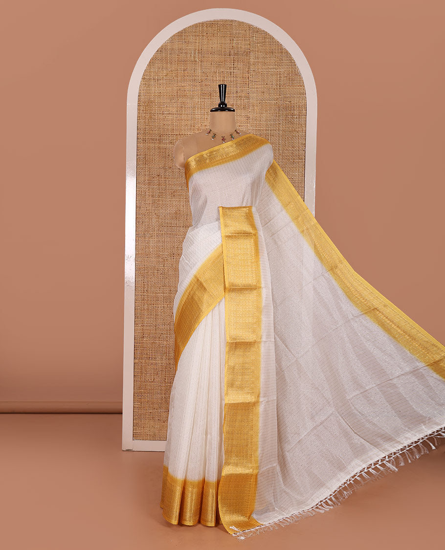 White and Yellow  Dola Silk Saree Decked Up with Vertical Zari Stripes All Over the Body, Complemented by a Contrast Border of Traditional Zari Designs, Self-Pallu of Stripes, and Paired with a Contrast Blouse