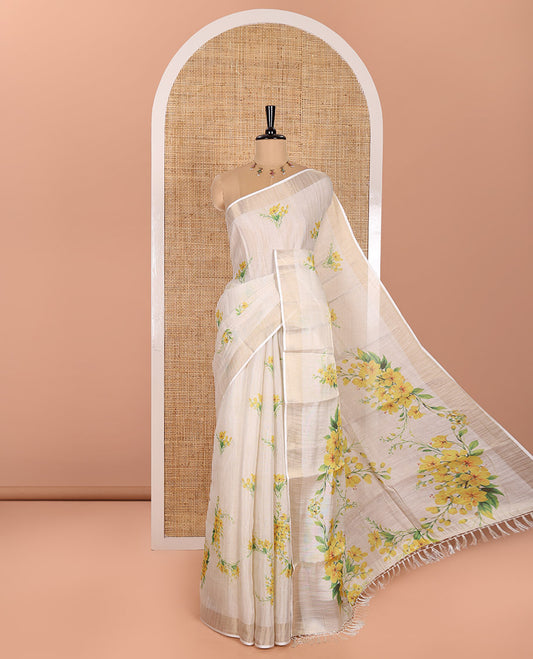 Cream Tissue Saree, Prettified with Yellow Floral Motifs Printed All Over Its Body, Subtle Bavanji Border, Pallu Features Floral Print, and Paired with a Matching Floral Printed Blouse