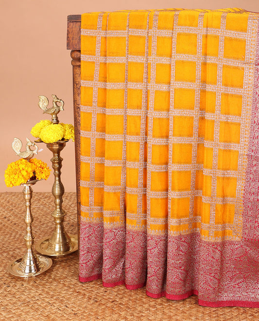 Mustard yellow rudraksh checks pattern fancy crape copper zari banaras border & rich pallu along with butta design blouse