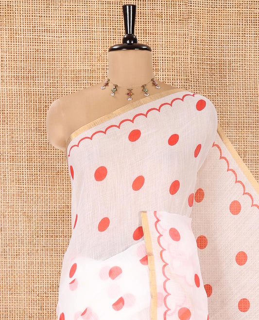 White Linen Cotton Saree, Beautified with Polka Dots All Over Its Body, Subtle Piping Border, Self-Pallu, and Paired with a Floral Printed Matching Blouse