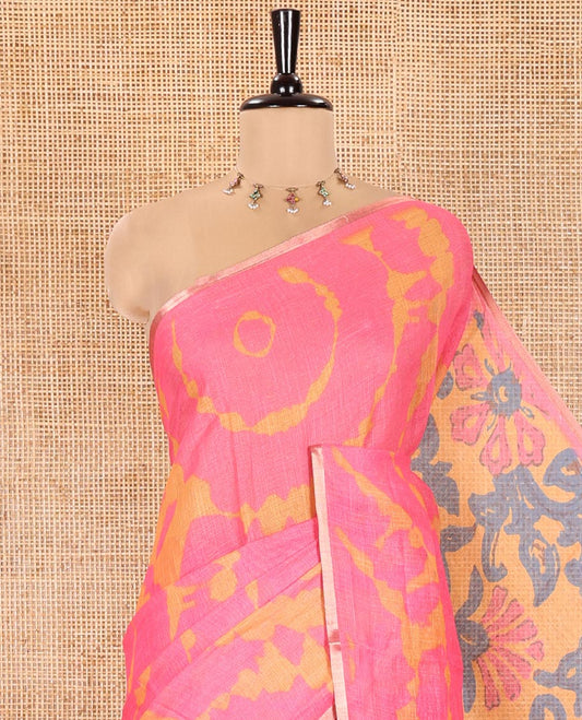Pink Linen Cotton Saree, Ornamented with Shibori Printed on Its Body, Subtle Piping Border, Pallu Features Floral Print, and Paired with a Contrast Floral Printed Blouse