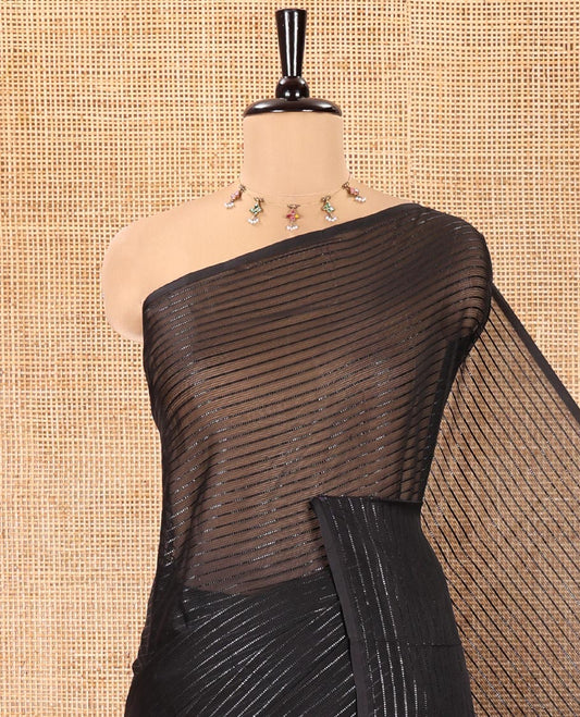 Borderless Black Chiffon Saree, Gleamed Up with Horizontal Stripes on Its Body, a Self-Pallu, and Comes Without a Blouse