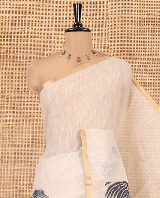 Chikku Linen Cotton Saree, Accentuated with Zebra Motifs Print, A Subtle Piping Border, Zebra Printed Pallu, and Comes with a Contrast Blouse