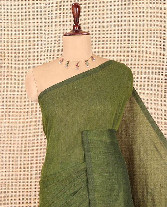 Borderless Olive Green Plain Khadi Cotton Saree, a Self-Pallu with Tassels, and a Matching Blouse