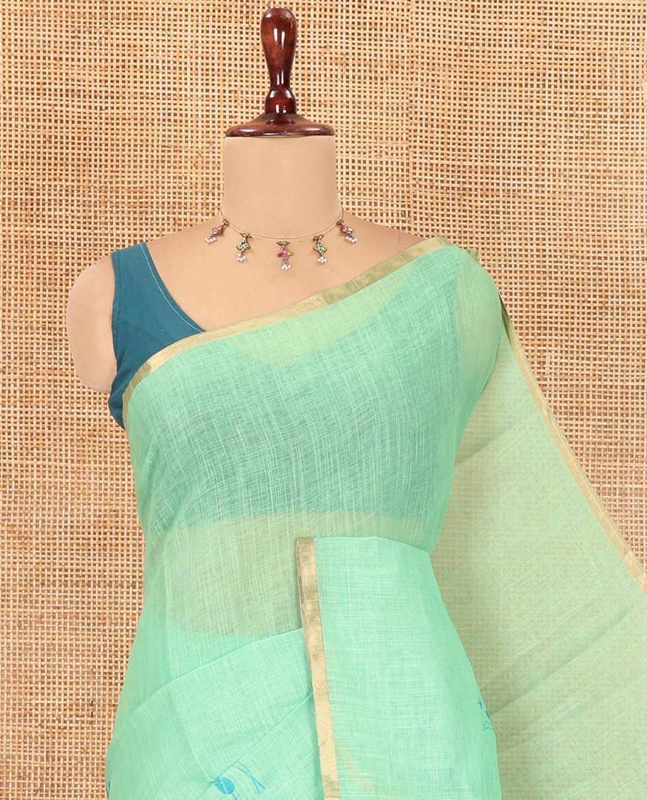 Borderless Green Linen Cotton Saree Features Lotus Print, a Self-Pallu, and a Matching Blouse