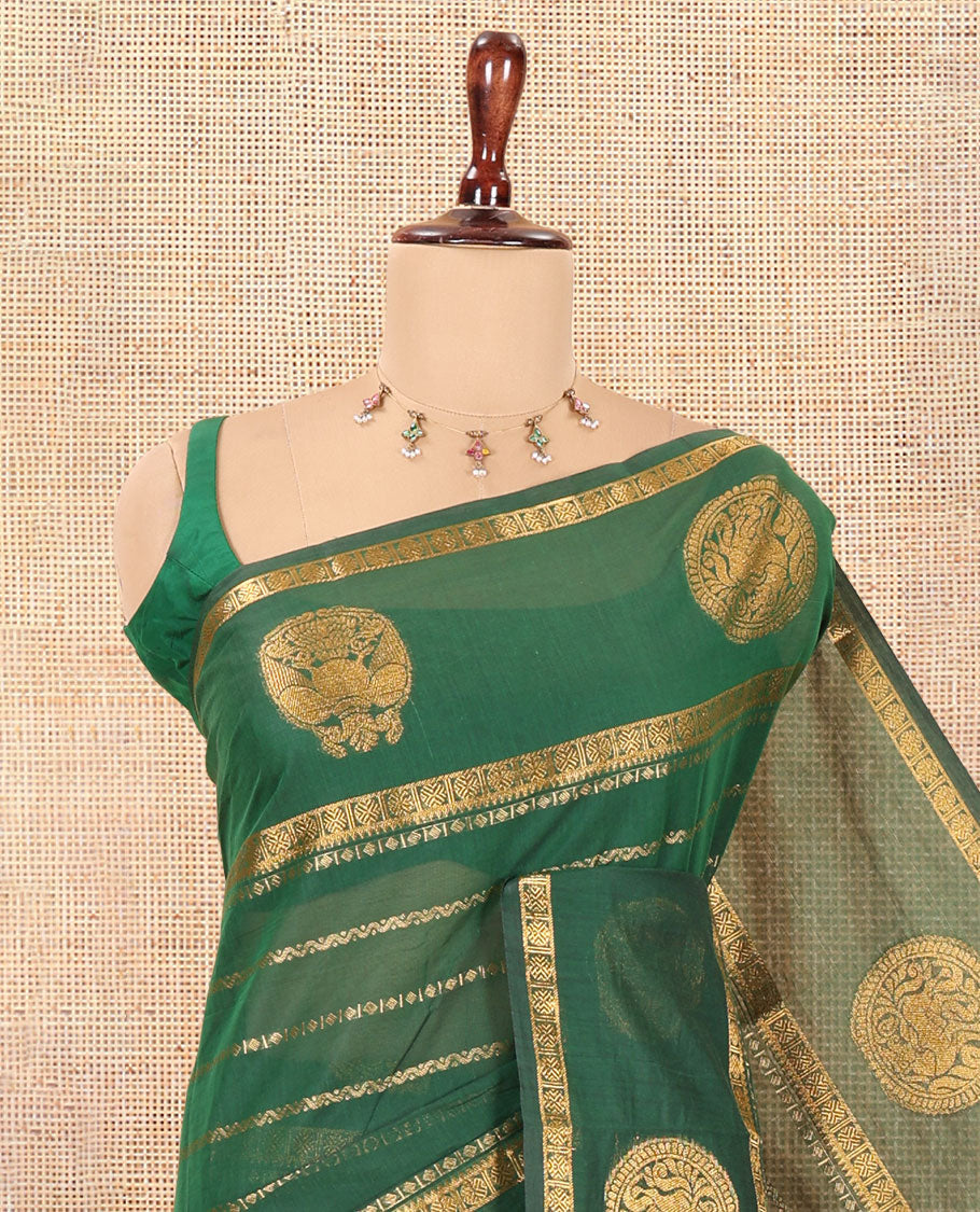 Green Chettinad Cotton Saree, Decorated with Zari Stripes, a Zari Iruthalai Pakshi-Yaali Border, Grand Pallu, and a Matching Blouse