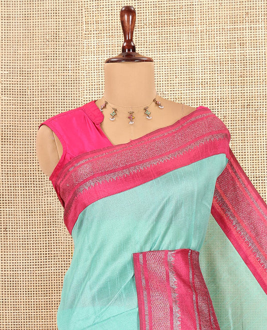 Sea Blue Plain Semi-Raw Silk Saree, a Contrast Silver Zari Border, a Contrast Pallu, and a Contrast Blouse