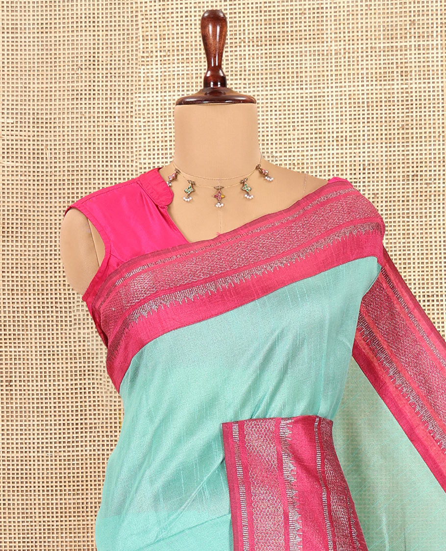 Sea Blue Plain Semi-Raw Silk Saree, a Contrast Silver Zari Border, a Contrast Pallu, and a Contrast Blouse