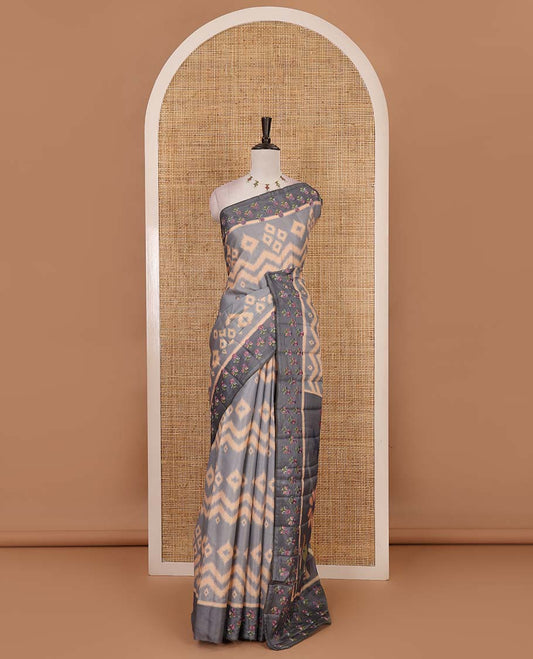 Grey pochampally ikkat style geometric printed fancy tussar saree, contrast floral motifs thread embroidered border, ikkat printed pallu, and plain blouse