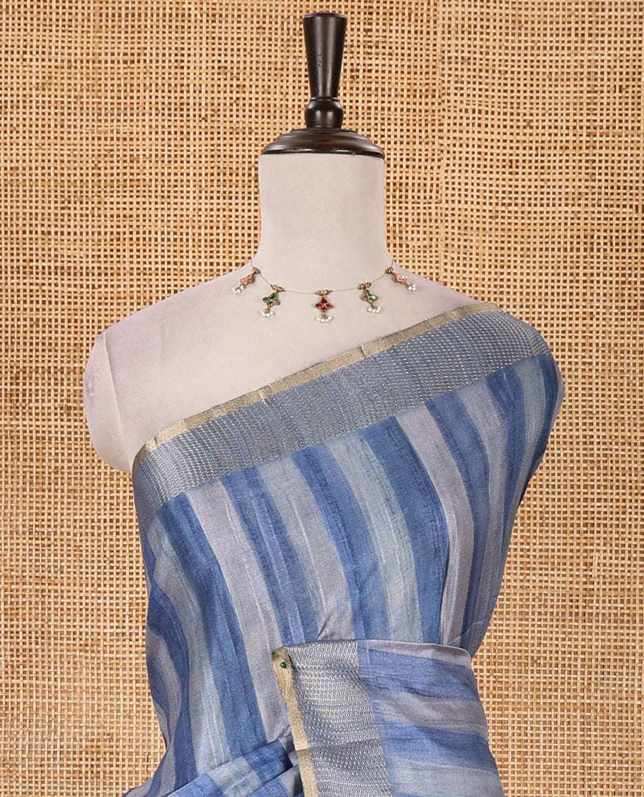 Indigo blue hand brushing-style vertical stripes printed fancy tussar silk saree, zig zag-style zari woven border, zari pallu & striped blouse