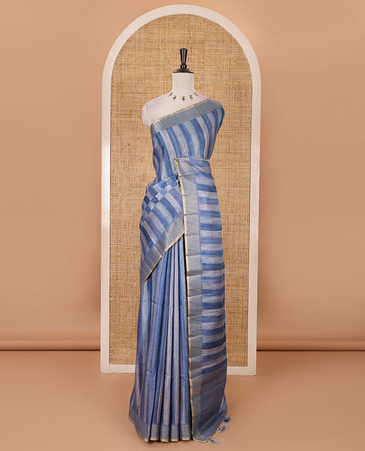 Indigo blue hand brushing-style vertical stripes printed fancy tussar silk saree, zig zag-style zari woven border, zari pallu & striped blouse