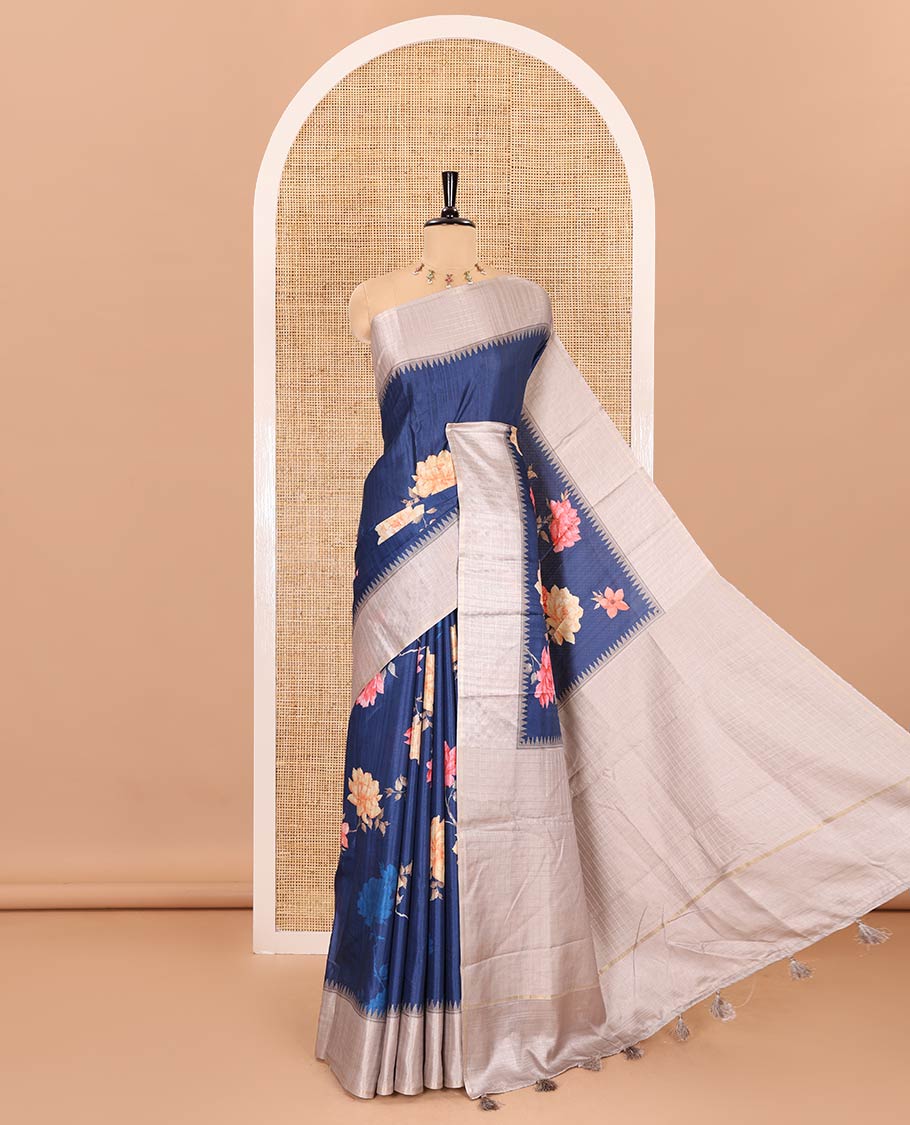 Ink blue floral motifs printed fancy tussar saree, contrast temple checked border, checked pallu, and a contrast checks and floral printed blouse