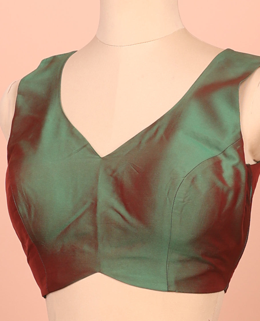 Green Dual-Toned Plain Readymade Blouse Featuring a Front V-Neck, Back Deep V-Neck, and Sleeveless
