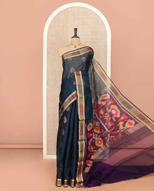 Blue Silk Cotton Saree Decorated with Zari Buttas All Over the Body, Highlighted with Ikkat Border, Contrast Pallu Elevated with Colorful Ikkat Weave, and Paired with a Contrast Blouse