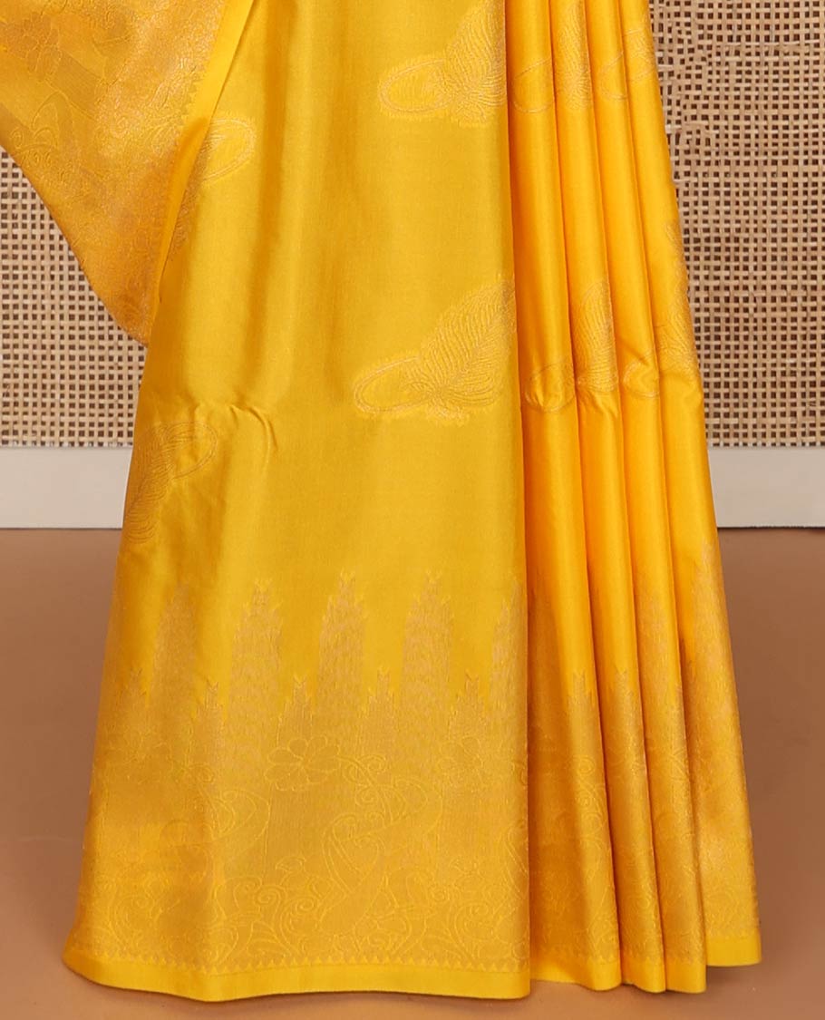 Orange leaf motifs soft silk saree with self zari design border & floral design pallu