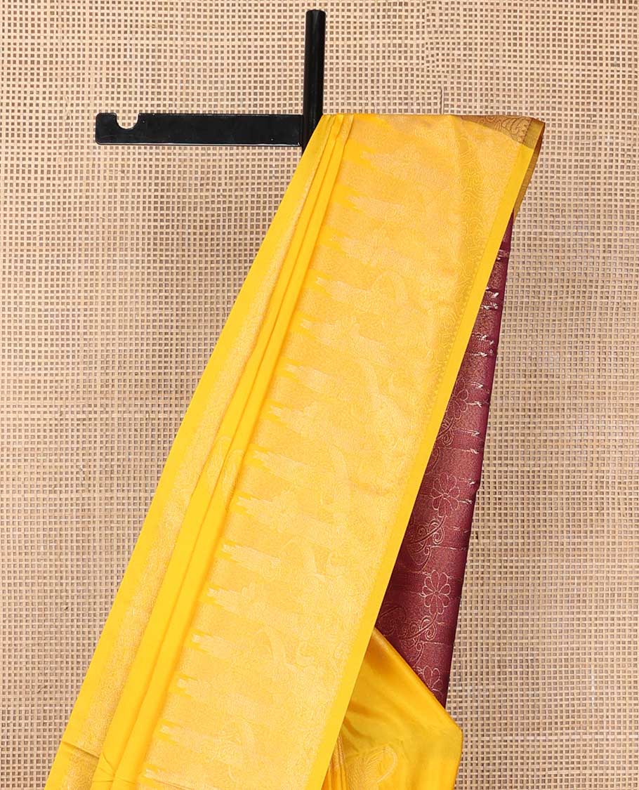 Orange leaf motifs soft silk saree with self zari design border & floral design pallu