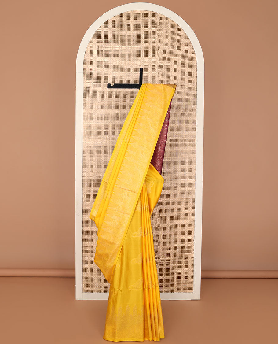 Orange leaf motifs soft silk saree with self zari design border & floral design pallu