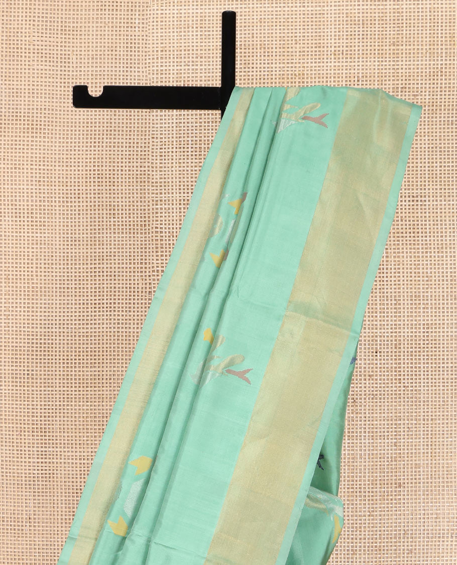 Green Uppada Silk Saree, Bedecked with Meena Zari Buttas on Its Body, Subtle Bavanji Border, Pallu of Meenakari Zari Buttas, and Paired with a Matching Blouse