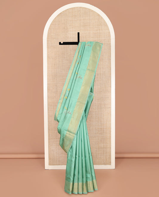Green Uppada Silk Saree, Bedecked with Meena Zari Buttas on Its Body, Subtle Bavanji Border, Pallu of Meenakari Zari Buttas, and Paired with a Matching Blouse