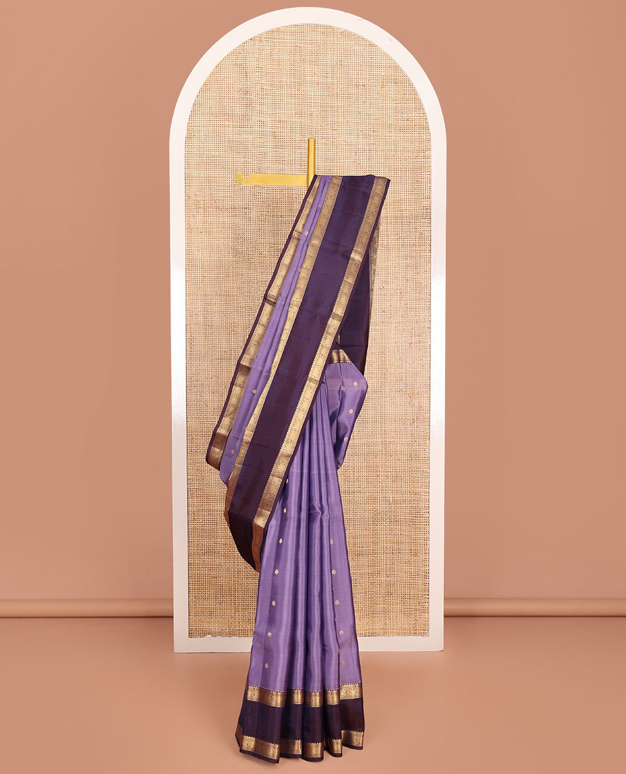 Lavender Vasundhara Lite-Silk Mix Saree, Embellished with Zari Buttas, Complemented by a Contrast Rettai Pettu Border of Kodi Visiry Designs, Grand Pallu of Jaal Design, and Paired with a Contrast Blouse