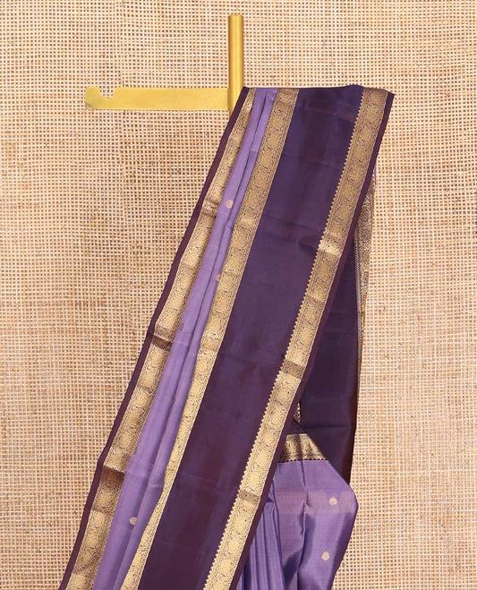 Lavender Vasundhara Lite-Silk Mix Saree, Embellished with Zari Buttas, Complemented by a Contrast Rettai Pettu Border of Kodi Visiry Designs, Grand Pallu of Jaal Design, and Paired with a Contrast Blouse