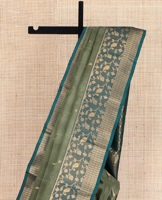 Green Vasundhara Lite Silk Mix Saree, Embellished with Muniya Zari Buttas, Complemented by a Contrast Paithani-Style Border of Zari Designs, Pallu Steeped with Paisley Designs, and Paired with a Contrast Blouse