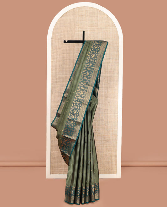 Green Vasundhara Lite Silk Mix Saree, Embellished with Muniya Zari Buttas, Complemented by a Contrast Paithani-Style Border of Zari Designs, Pallu Steeped with Paisley Designs, and Paired with a Contrast Blouse