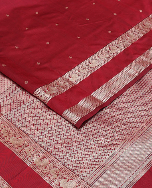 Maroon buttas Vasundhara elite silksaree, jaal pallu & border of thilakam,banaras,paisa,rettai neli,mayil kann,mayil & yaali