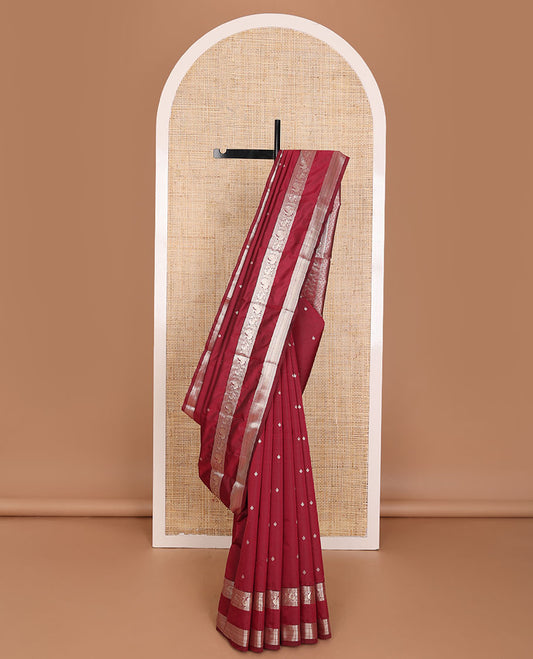 Maroon buttas Vasundhara elite silksaree, jaal pallu & border of thilakam,banaras,paisa,rettai neli,mayil kann,mayil & yaali