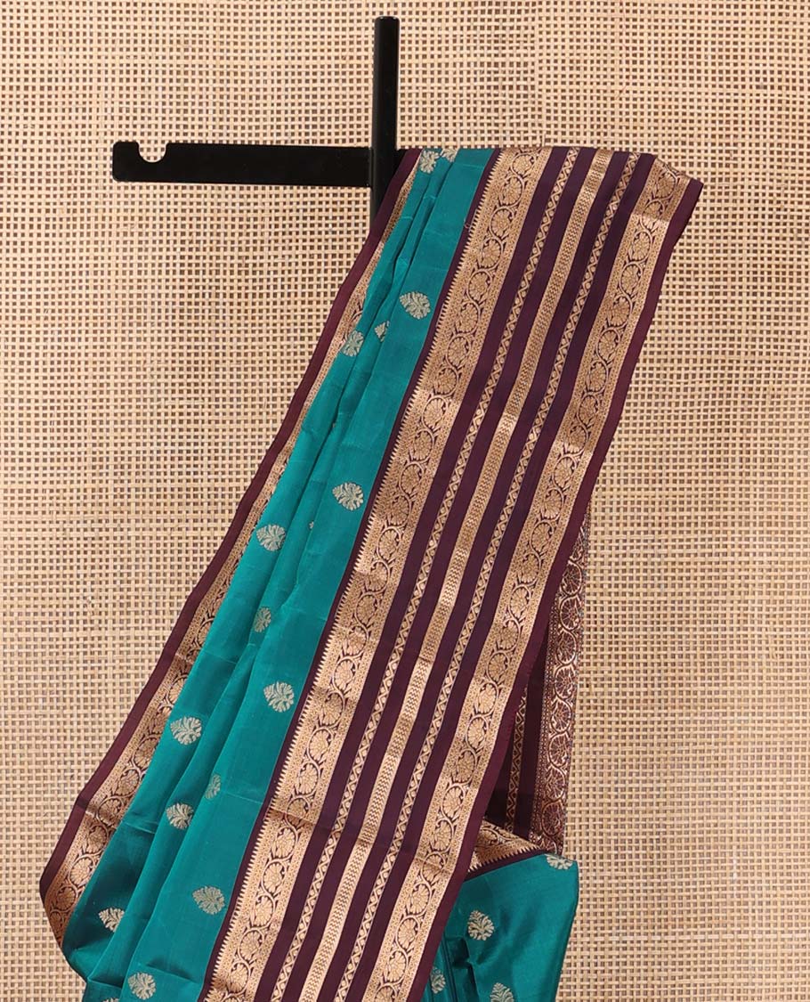 Green zari buttas Vasundhara silk mix saree, contrast border of rekku, neli, vanki, and kodi visiry designs, and temple design pallu