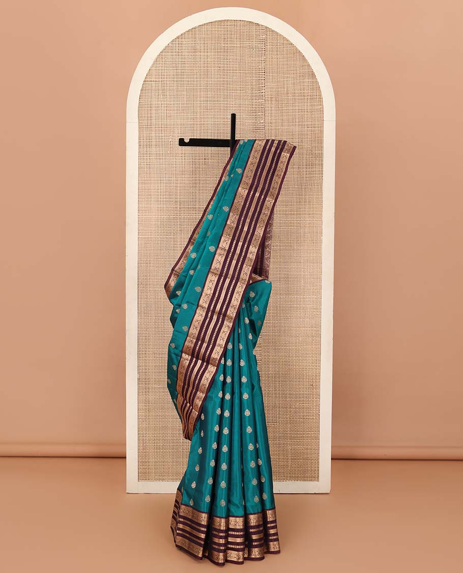 Green zari buttas Vasundhara silk mix saree, contrast border of rekku, neli, vanki, and kodi visiry designs, and temple design pallu