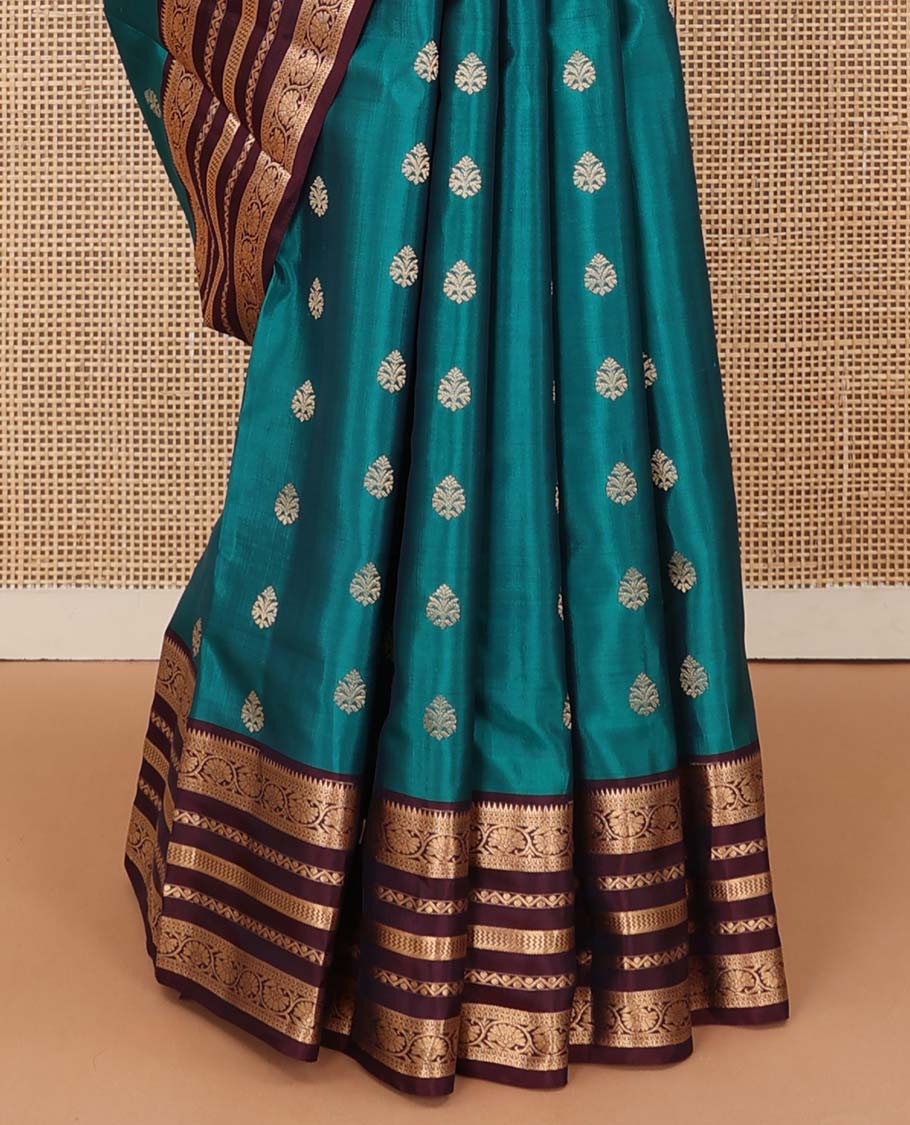 Green zari buttas Vasundhara silk mix saree, contrast border of rekku, neli, vanki, and kodi visiry designs, and temple design pallu