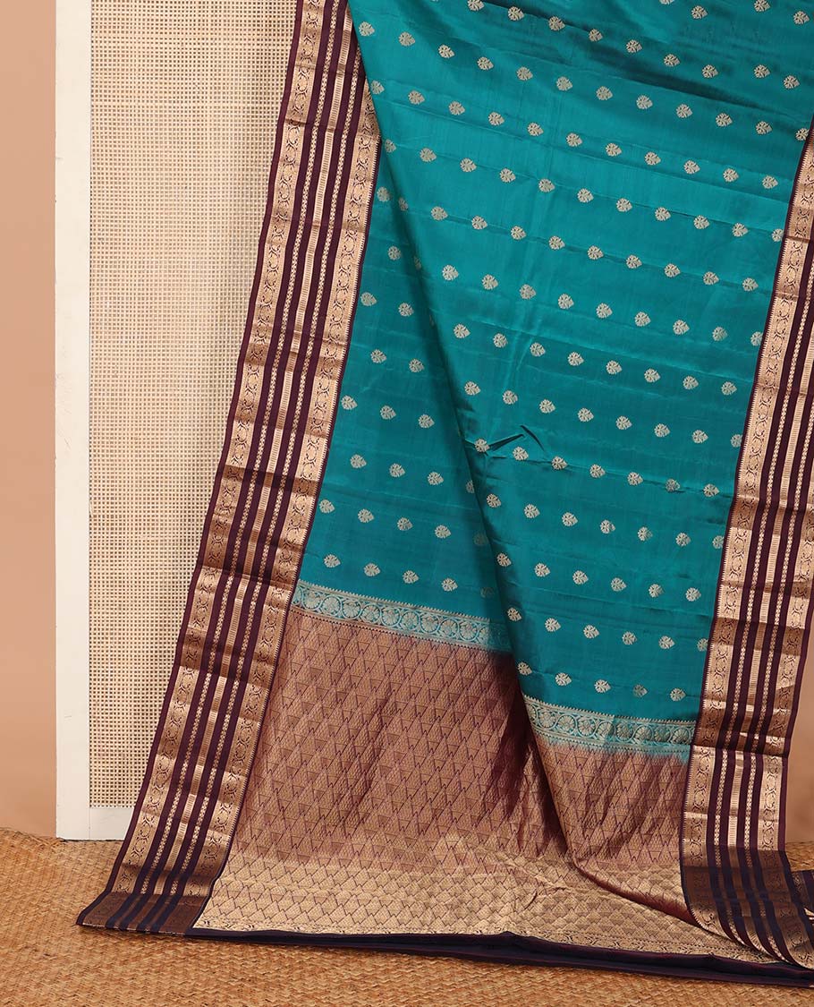 Green zari buttas Vasundhara silk mix saree, contrast border of rekku, neli, vanki, and kodi visiry designs, and temple design pallu