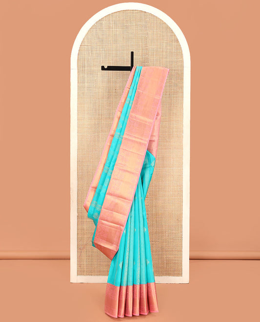 Blue Vasundhara Lite Silk Mix Saree, Adorned with Zari Designs on Its Body, Complemented by a Contrast Border of Mayil, Chakram, and Kuyil Kann Designs, Gleaming Jaal Pallu, and Paired with a Contrast Blouse