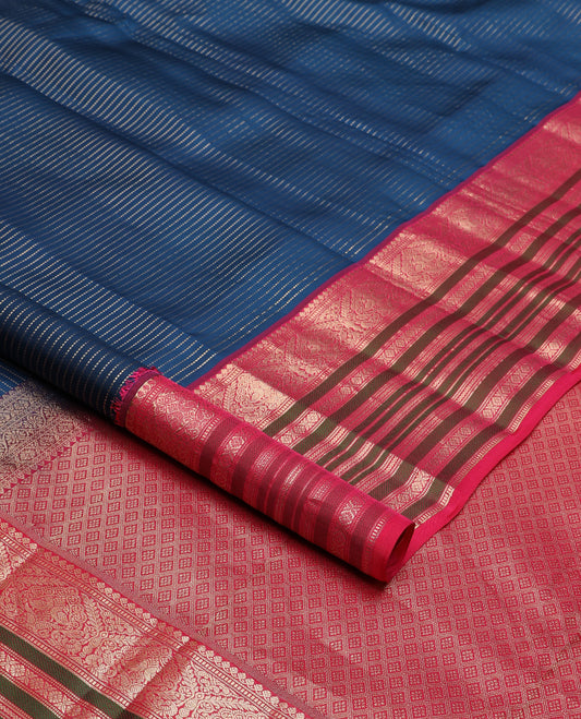 Blue zari buttas silk saree, contrast border steeped with traditional zari designs, and jaal pallu