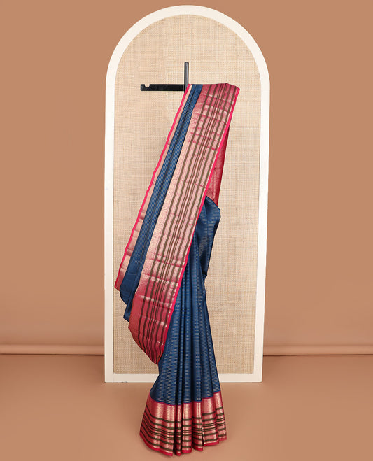 Blue zari buttas silk saree, contrast border steeped with traditional zari designs, and jaal pallu
