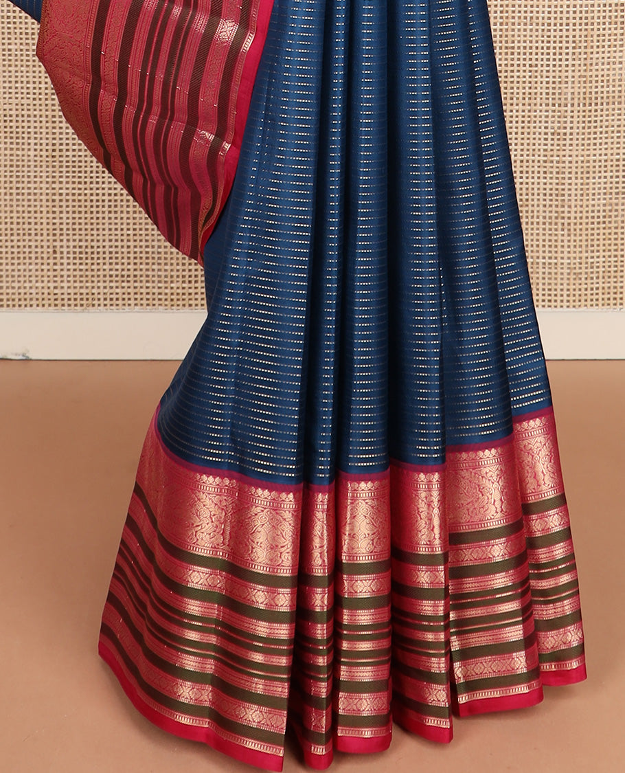 Blue zari buttas silk saree, contrast border steeped with traditional zari designs, and jaal pallu