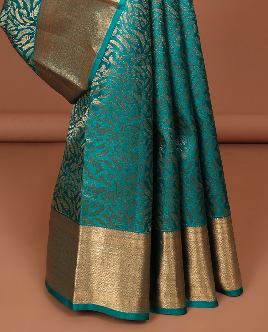 Green leaf design kancheepuram silk saree with self border of zari design & argyle pattern pallu