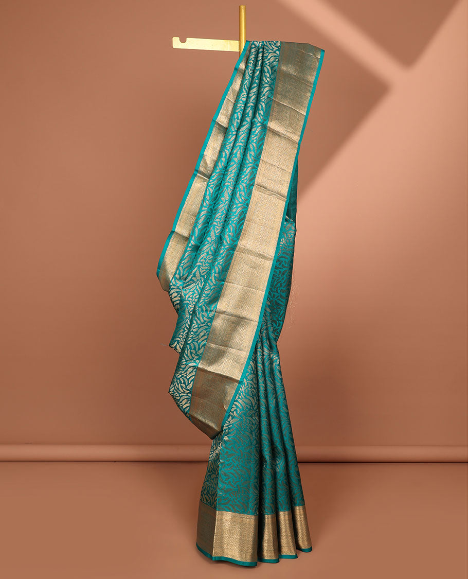 Green leaf design kancheepuram silk saree with self border of zari design & argyle pattern pallu