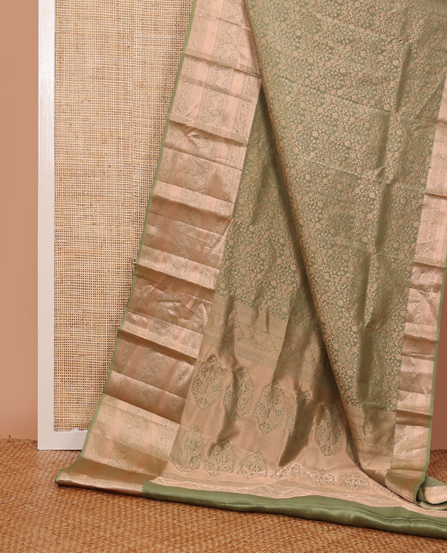 Green floral jaal jacquard wedding silk saree, intricately accentuated pallu & border of thilakam,neli,mayil,annam & kuthirai designs