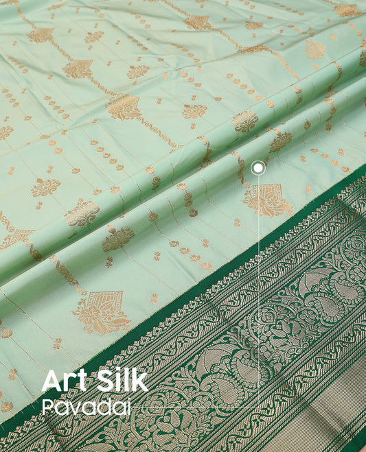 Pista green art silk pavadai set, zari design with contrast traditional zari bordered skirt and a contrast zari design blouse