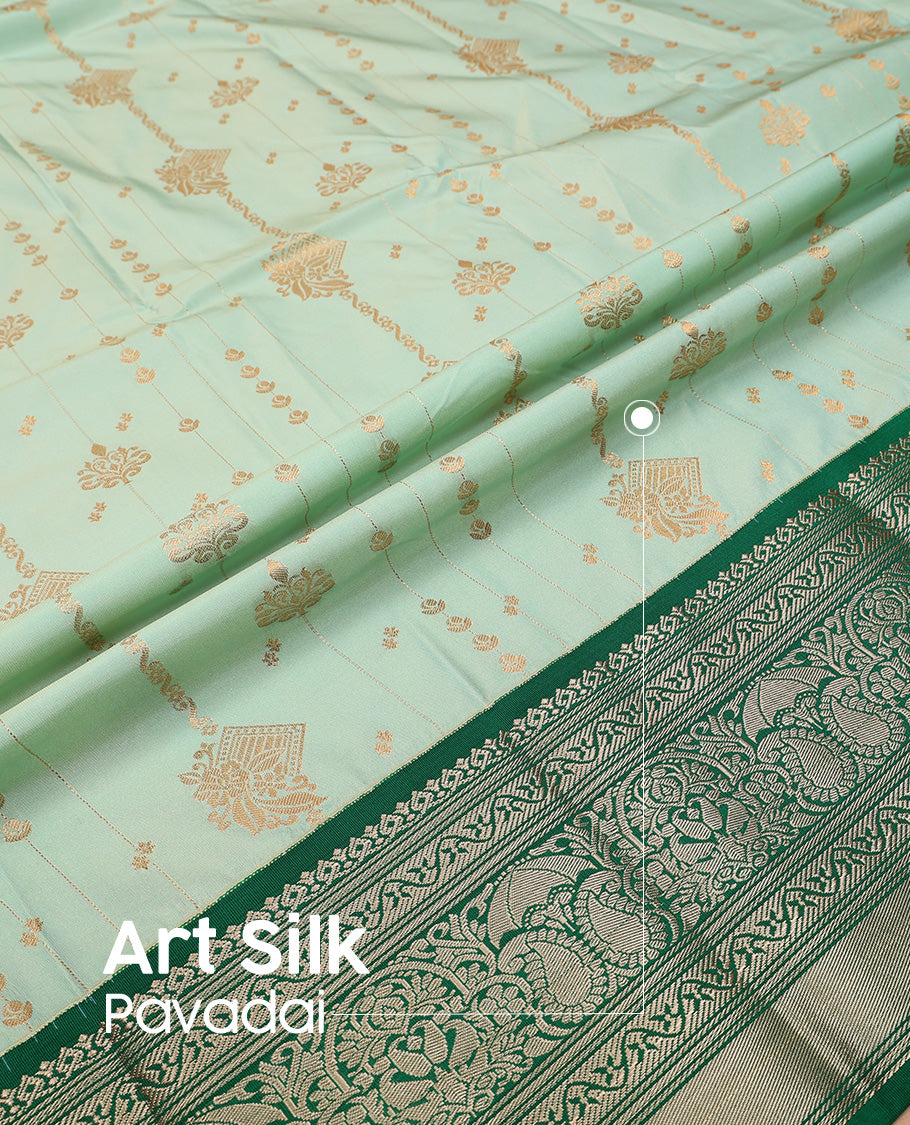 Pista green art silk pavadai set, zari design with contrast traditional zari bordered skirt and a contrast zari design blouse