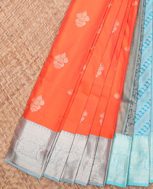 Orange Budget Silk Saree, Prettified with Floral Buttas All Over Its Body, Complemented by a Contrast Traditional Zari Design Border, Pallu Features Greek Key and Paisley Designs, and Paired with a Contrast Blouse