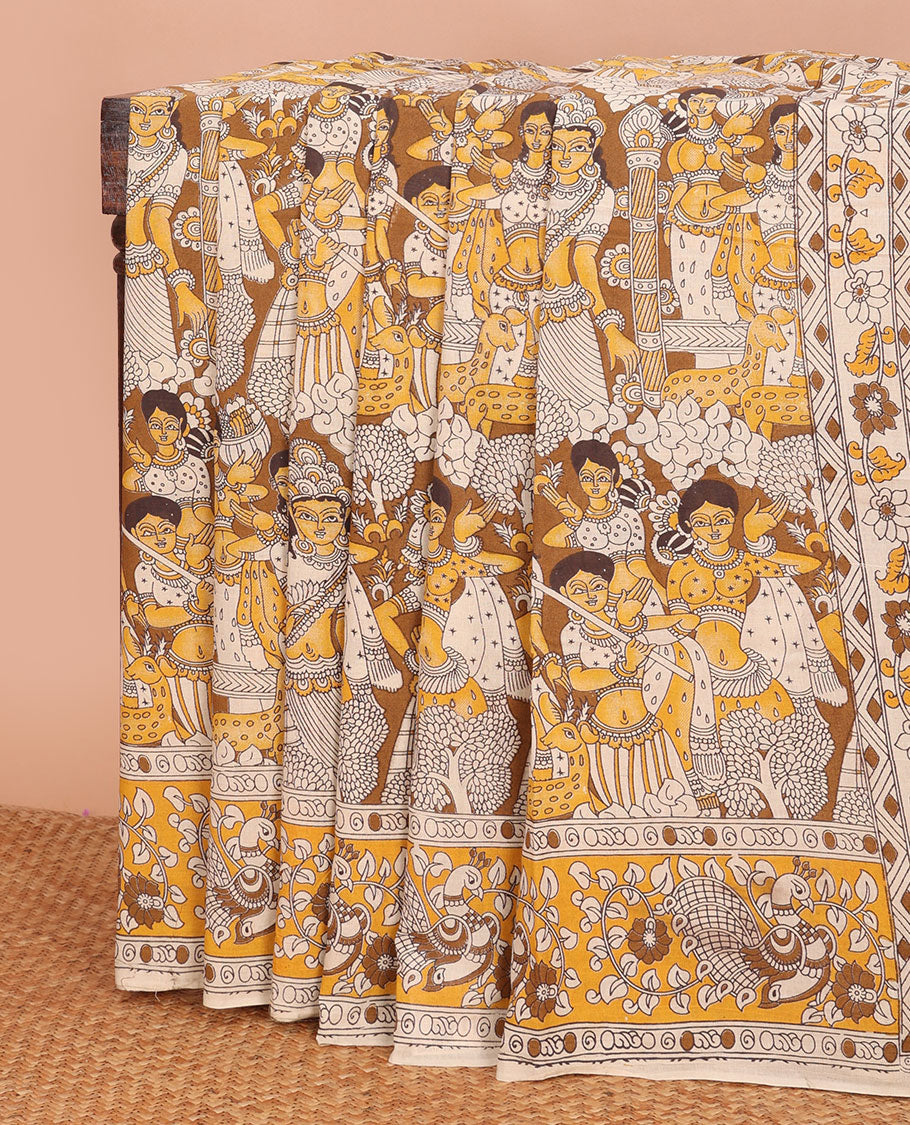 Yellow-mustrad human motifs machine-printed kalamkari cotton saree, peacock printed border & pallu of pichwai cow & Radha Krishna print