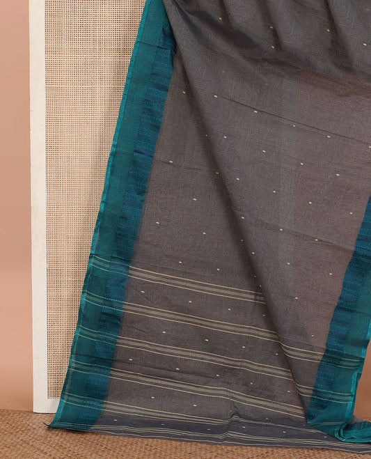Grey Bengal Cotton Saree, Featuring Buttas All Over Its Body, Complemented by Contrast Thread Border of Floral and Peacock Eye Patterns, and Pallu Steeped with Stripes