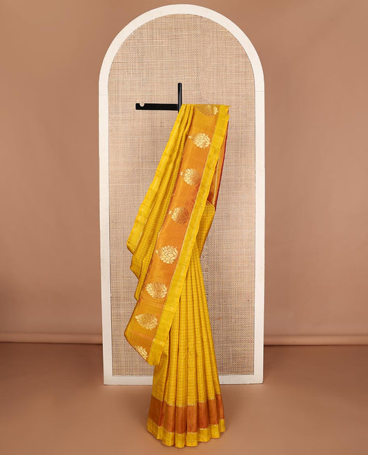 Yellow checked design, and zari buttas Kanchipuram silk saree, contrast zari butta border, and floral dsign pallu