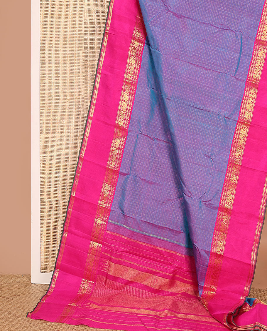 Blue zari checked Kanchipuram silk saree, contrast rettai pettu border of salngai, muthu, kathir, and kodi mayil and yaanai designs