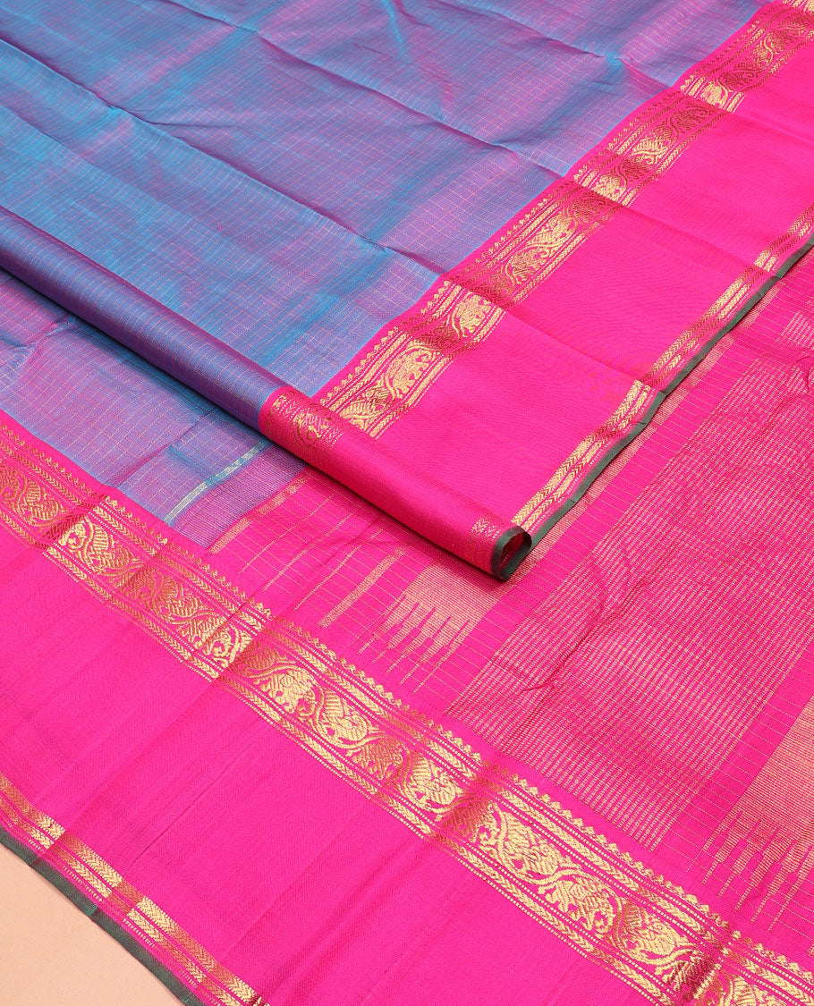 Blue zari checked Kanchipuram silk saree, contrast rettai pettu border of salngai, muthu, kathir, and kodi mayil and yaanai designs