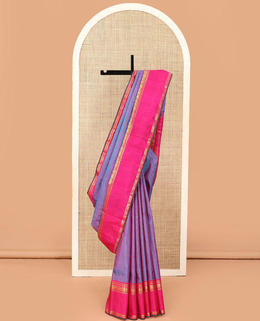 Blue zari checked Kanchipuram silk saree, contrast rettai pettu border of salngai, muthu, kathir, and kodi mayil and yaanai designs