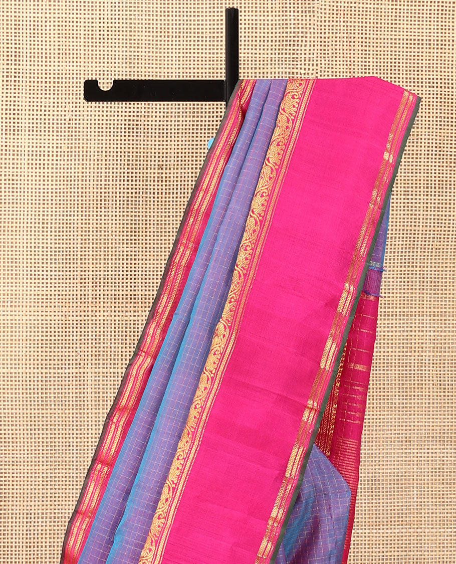 Blue zari checked Kanchipuram silk saree, contrast rettai pettu border of salngai, muthu, kathir, and kodi mayil and yaanai designs